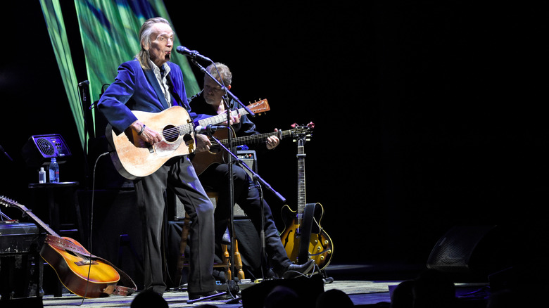 Lightfoot singing with guitar