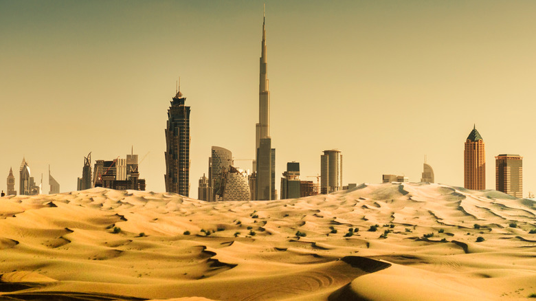 A city skyline surrounded by desert