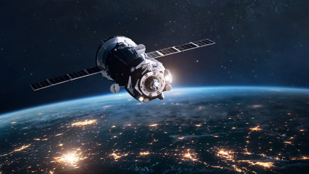 Satellite orbing Earth image via NASA