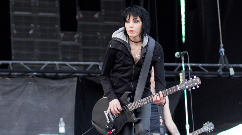 Joan Jett playing guitar