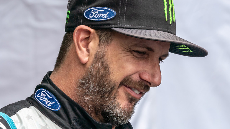 Ken Block smiling staring down