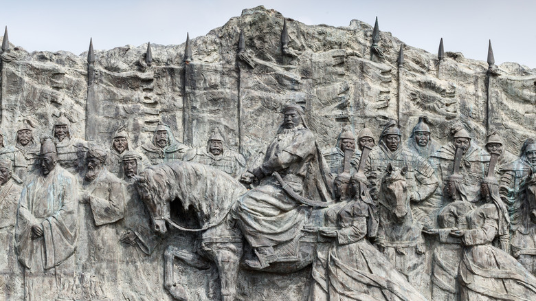 Stone carving Kublai Khan and troops 