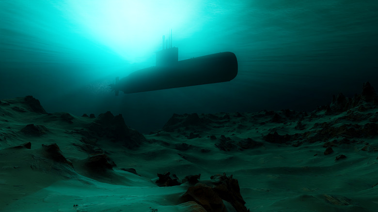 Image a submerged submarine with light shining down into water