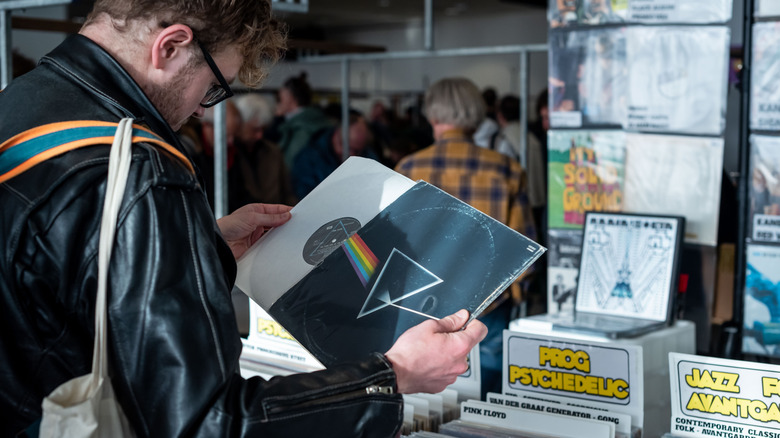 Record collector browsing vinyl collection