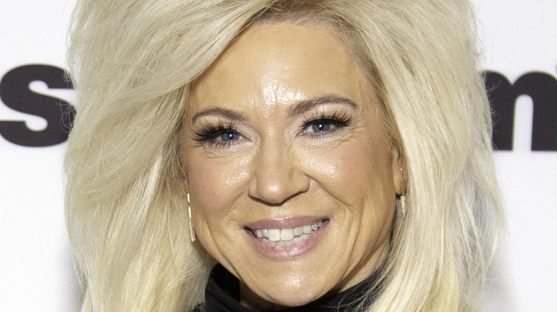 Theresa Caputo flashes a smile