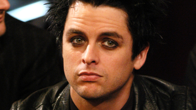 Billie Joe Armstrong of Green Day looking away