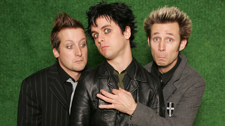 Green Day embracing and mugging