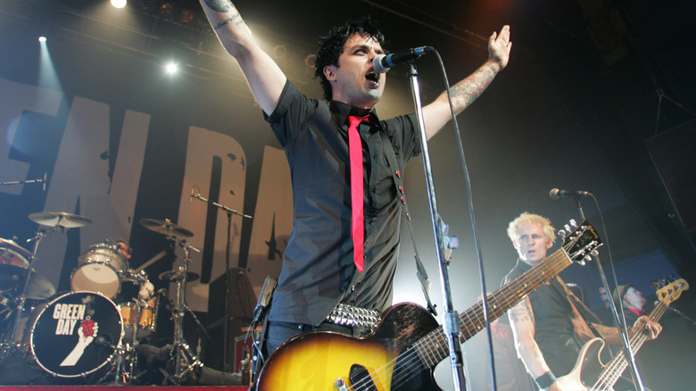 Green Day performing during American Idiot era