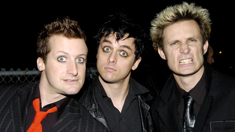 Green Day making faces backstage at event