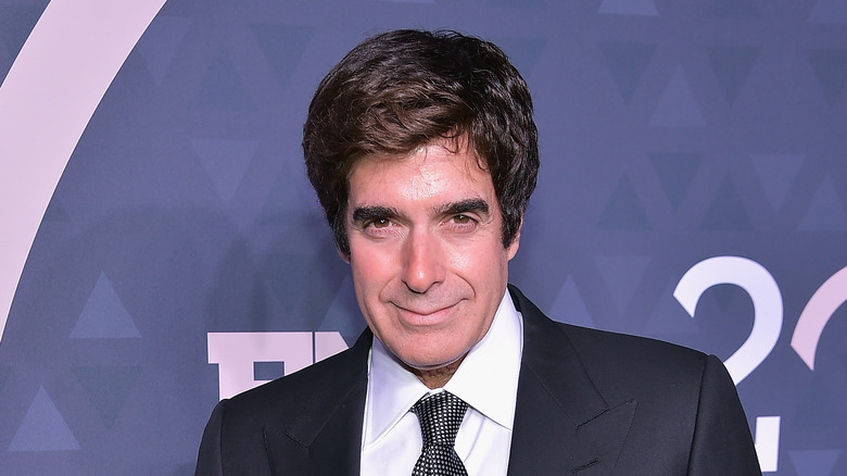 David Copperfield suit smiling
