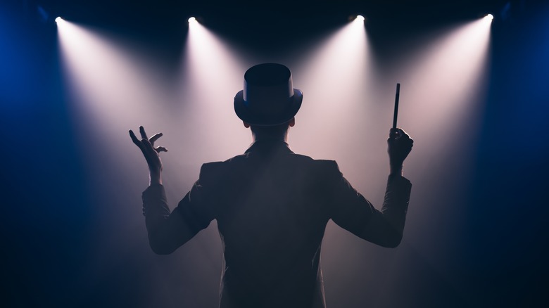 silhouette of a magician