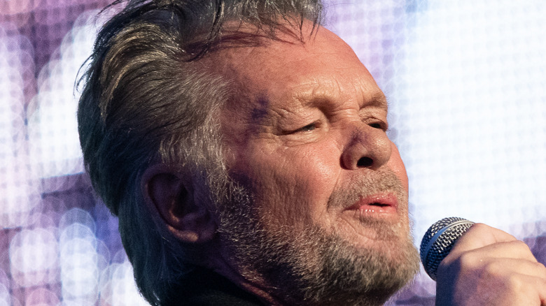 john mellencamp performing on stage