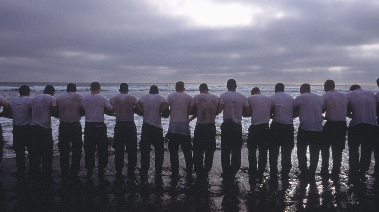 Navy seal candidates entering ocean