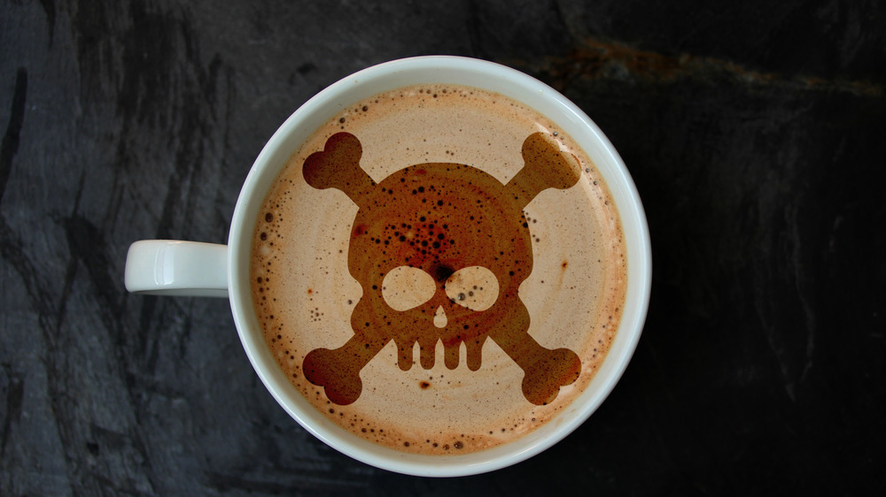 Skull and crossbones in coffee