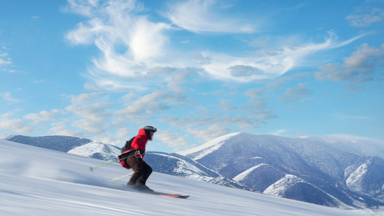 Skier going down a mountain