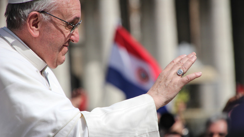Pope Francis wearing ring and waving