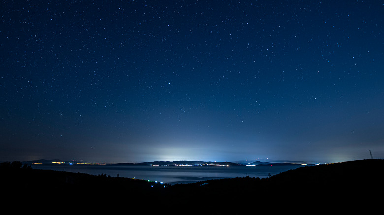 Night sky with coast at bottom