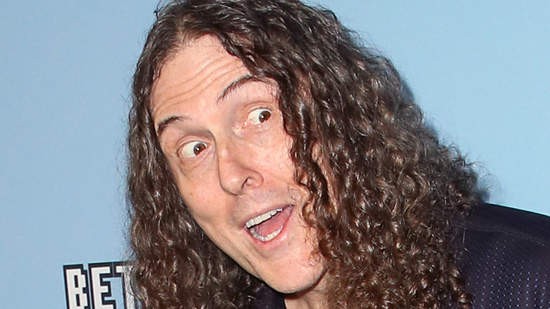 Weird Al Yankovic posing at event