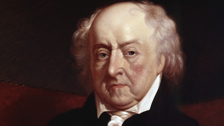 John Adams frowns