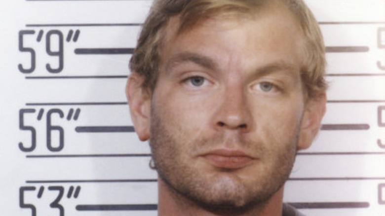 Jeffrey Dahmer posing for mugshot