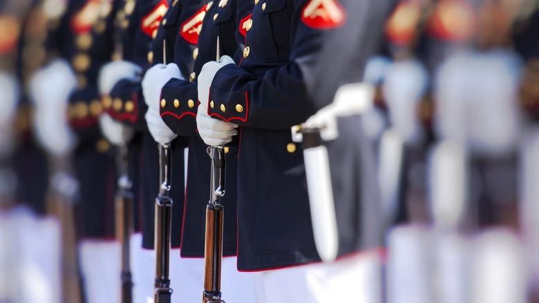 Marines in dress uniform in a row 