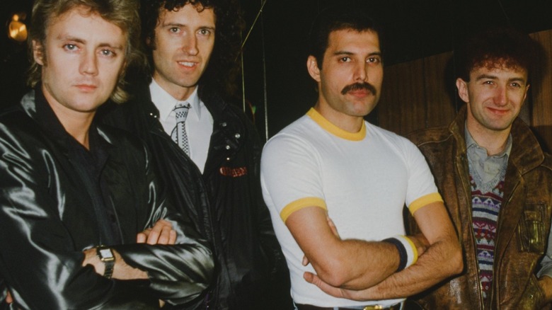 Queen posing for band photo