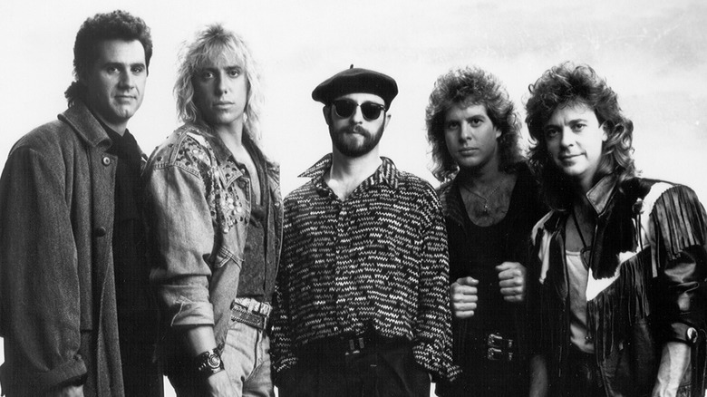 Night Ranger posing for a photo
