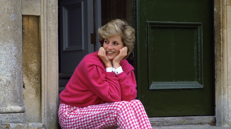 Princess Diana sitting on steps