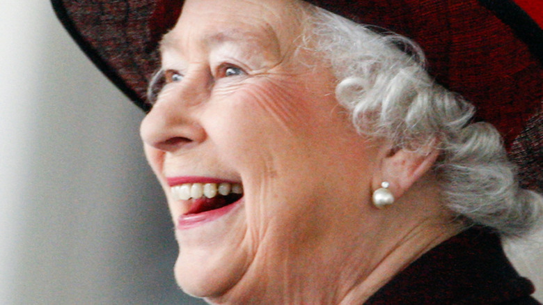 Queen Elizabeth smiling in profile