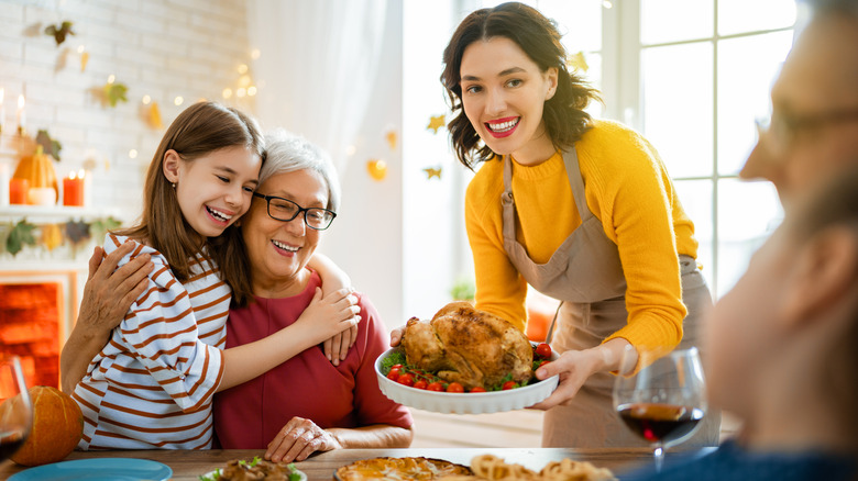 a family celebrating thanksgiving