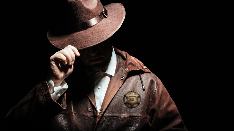 Sheriff tipping hat