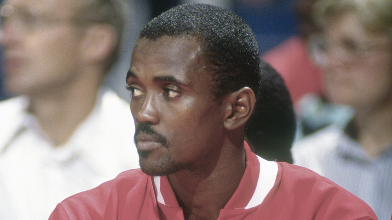 Craig Hodges sits on bench