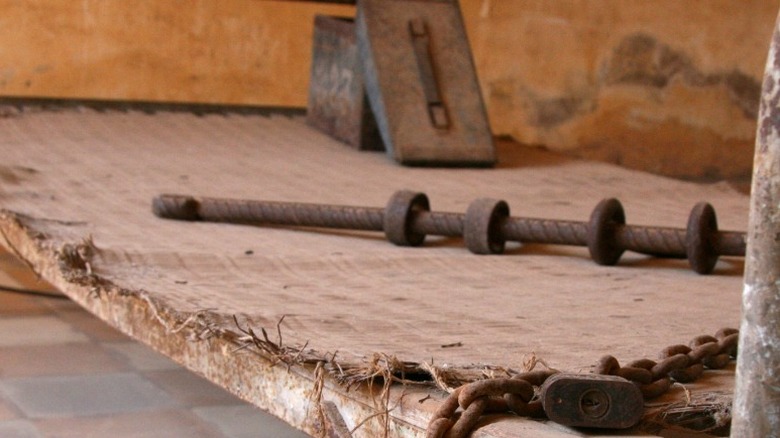 Torture bed and instruments