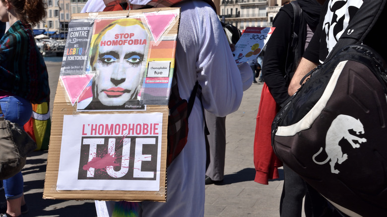 protest demonstration stop homophobia pink triangle