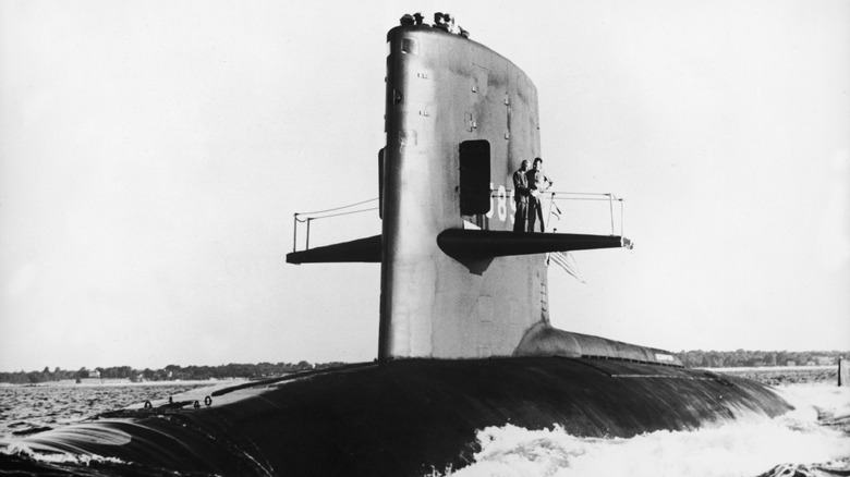 View of the several crewmen on the tower of the USS Scorpion