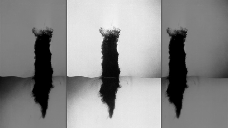 Composite photograph of impact point, debris, and burn trail of 1951 crash at Thule Air Base.