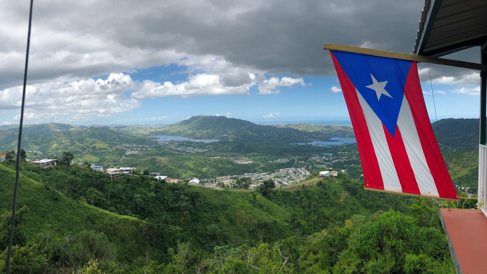 Puerto Rico mountains and flag