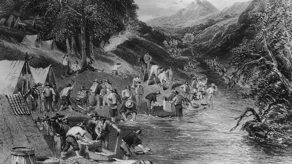 panning for gold during gold rush
