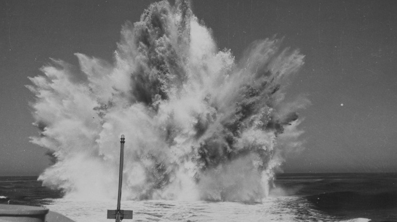 A depth charge exploding in the ocean during WWII