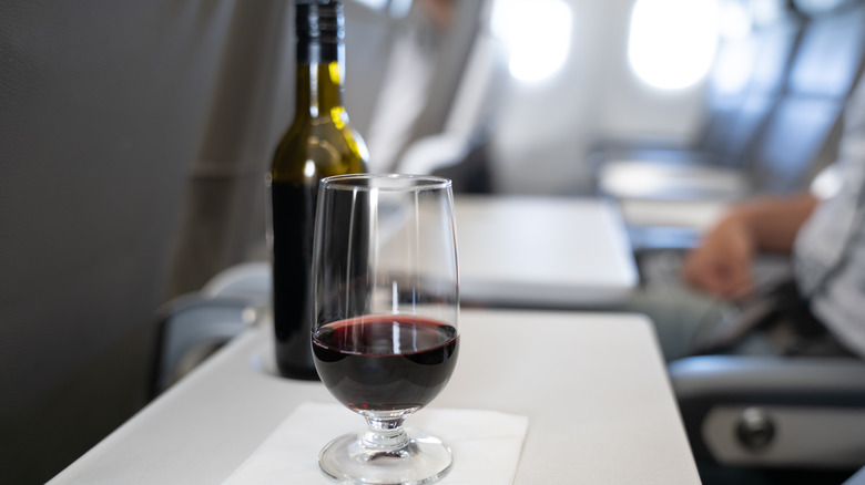 red wine on a tray table