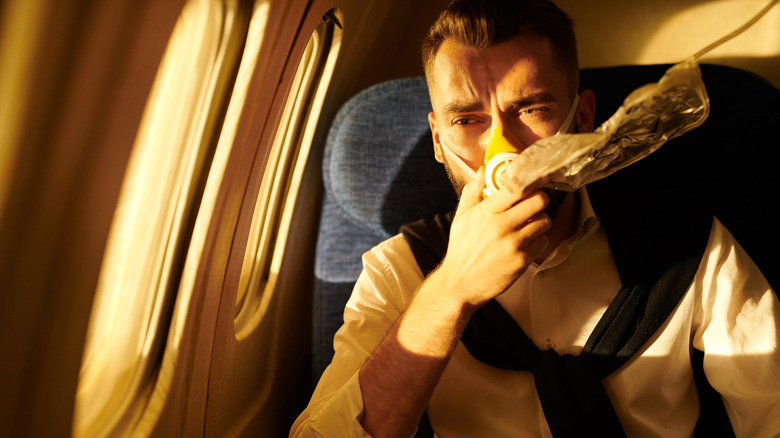man wearing an oxygen mask
