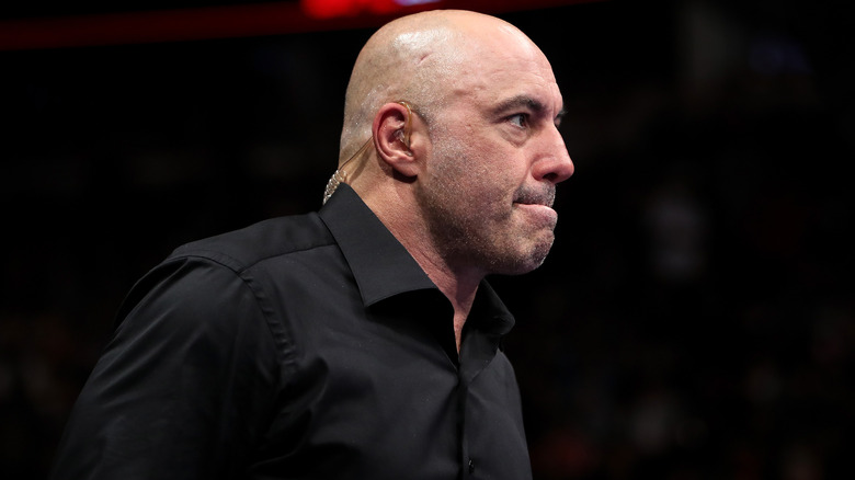 Joe Rogan black shirt wearing earpiece