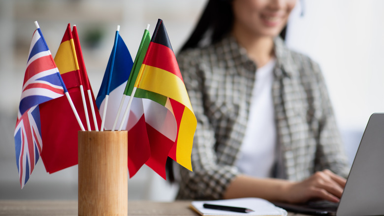 Colorful flags on an office desk.