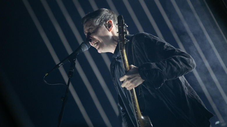 jonsi of sigur ros on dark stage