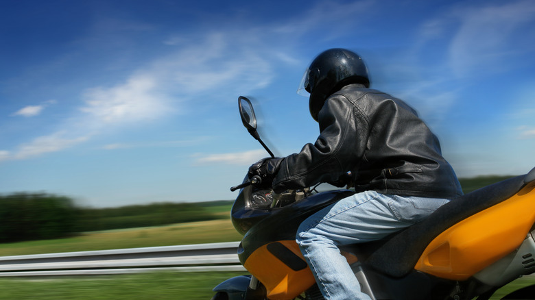 Biker on the road in motion