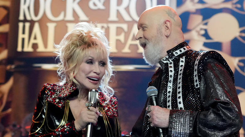 Dolly Parton and Rob Halford singing at Rock & Roll Hall of Fame induction