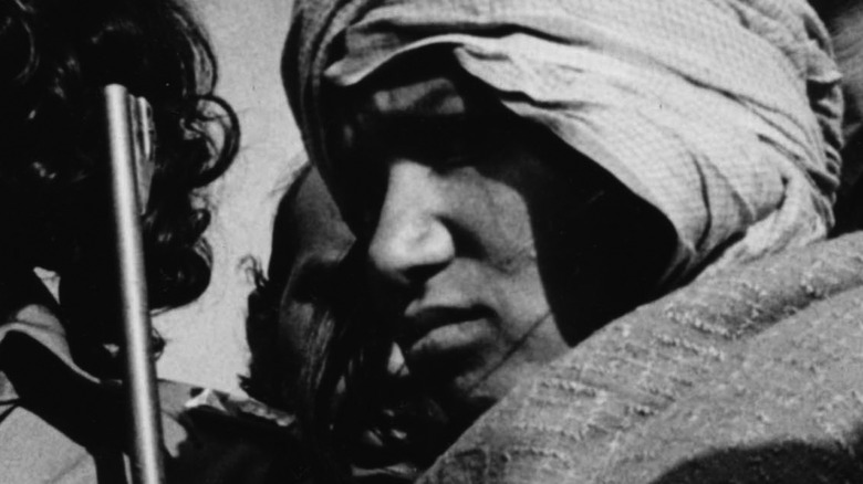 Phoolan Devi armed in shadow