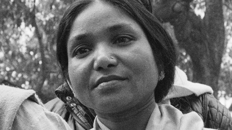 Phoolan Devi looking past camera