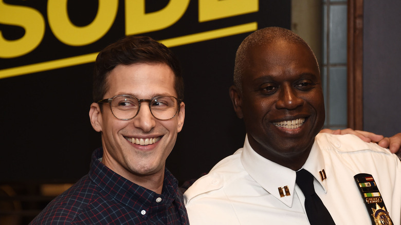 Andre Braugher and Andy Samberg onstage