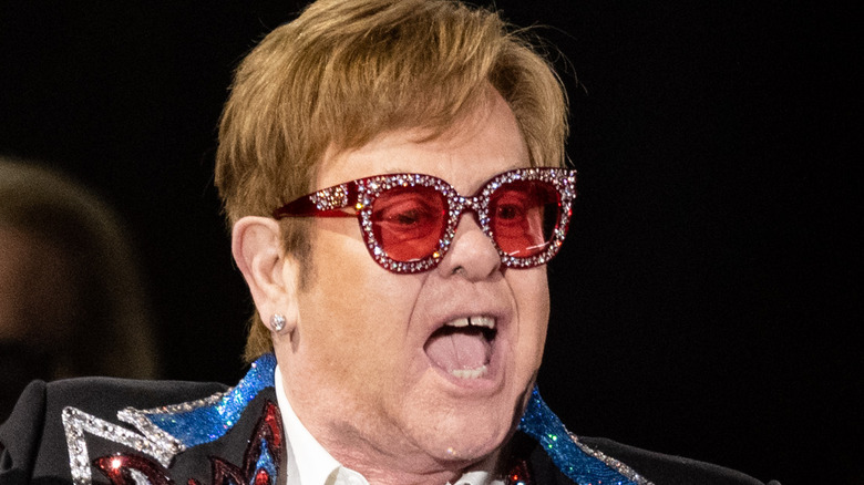 Elton John glasses glittery suit